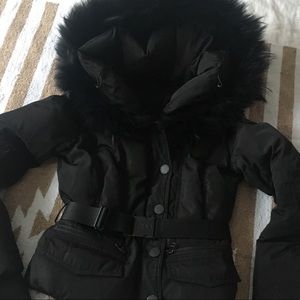 Belted coat with black fur.